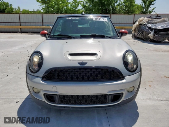 2013 MINI Convertible S с VIN WMWZP3C57DT705259, выставлен на аукционе Copart как лот 59954795 с пробегом 132 988 миль миль и Списание • Salvage title. История ставок и продаж доступна на DreamBid. Изображение 5.
