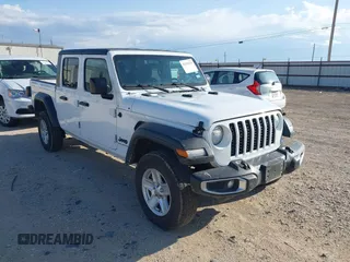 2023 Jeep Gladiator Sport S with VIN 1C6HJTAG0PL533933, listed as a IAAI auction lot 42351470 with 57,982 mi miles and . Bid and sale history available at DreamBid. Image 1.