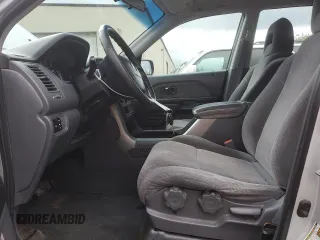 2005 Honda Pilot LX z VIN 2HKYF18195H511883, wystawiony jako Copart lot #53754595 z przebiegiem 269 419 mil mil oraz Szkoda całkowita • Salvage title. Historia ofert i sprzedaży dostępna na DreamBid. Obrazek 7.