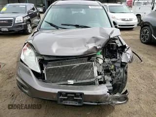 2011 Honda CR-V LX z VIN 5J6RE4H33BL083594, wystawiony jako Copart lot #50398955 z przebiegiem 173 634 mil mil oraz Szkoda całkowita • Salvage title. Historia ofert i sprzedaży dostępna na DreamBid. Obrazek 12.