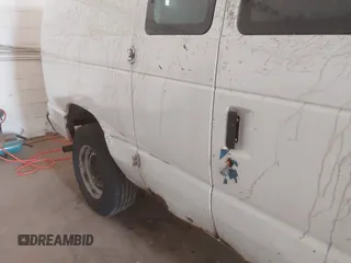 2011 Ford Econoline Cargo Commercial with VIN 1FTNE2EW9BDB11058, listed as a IAAI auction lot 42202069 with 282,179 mi miles. Bid and sale history available at carsss.com. Image 6.