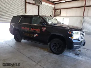 2020 Chevrolet Tahoe Commercial with VIN 1GNLCDEC1LR297818, listed as a Copart auction lot 74242524 with 35,716 mi miles and Salvage Title. Bid and sale history available at carsss.com. Image 4.