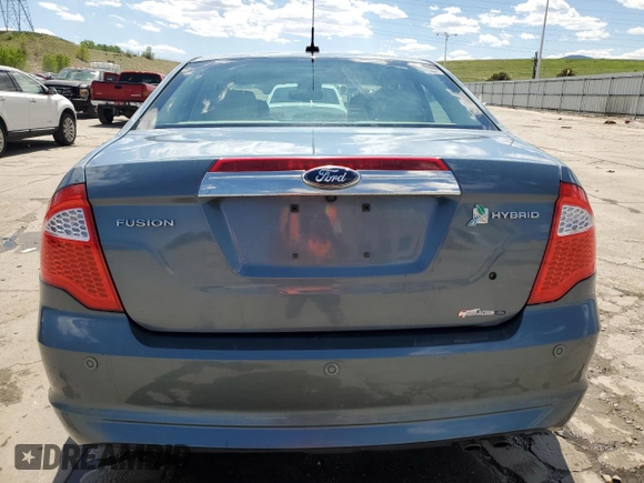 2012 Ford Fusion Hybrid z VIN 3FADP0L3XCR176552, wystawiony jako Copart lot #55787415 z przebiegiem 156 806 mil mil oraz Szkoda całkowita • Salvage title. Historia ofert i sprzedaży dostępna na DreamBid. Obrazek 6.