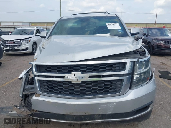 2016 Chevrolet Tahoe LS with VIN 1GNSCAEC2GR392937, listed as a IAAI auction lot 42648714 with 166,764 mi miles and . Bid and sale history available at DreamBid. Image 11.