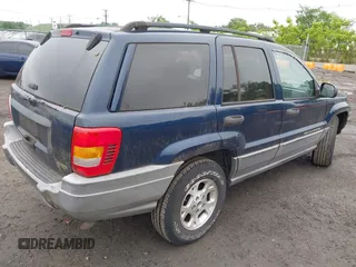 2002 Jeep Grand Cherokee Sport с VIN 1J4GW38S42C166263, выставлен на аукционе IAAI как лот 42521707 с пробегом 267 842 миль миль и . История ставок и продаж доступна на DreamBid. Изображение 4.