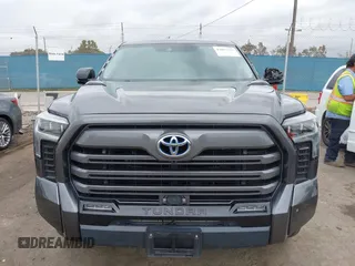 2023 Toyota Tundra Limited Hybrid with VIN 5TFJC5DB7PX021014, listed as a IAAI auction lot 42067753 with 64,991 mi miles and . Bid and sale history available at DreamBid. Image 12.