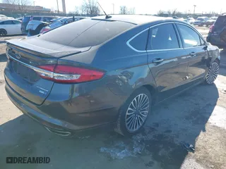 2018 Ford Fusion Titanium with VIN 3FA6P0D95JR138770, listed as a IAAI auction lot 41411388 with 107,540 mi miles. Bid and sale history available at carsss.com. Image 4.