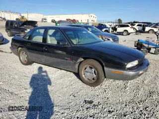 1996 Buick Regal with VIN 2G4WF52K3T1407254, listed as a Copart auction lot 41430805 with 150,458 mi miles and Salvage Title. Bid and sale history available at DreamBid. Image 4.