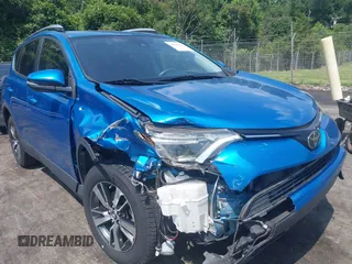 2018 Toyota RAV4 XLE with VIN JTMWFREVXJJ751586, listed as a IAAI auction lot 42586337 with 55,821 mi miles and . Bid and sale history available at DreamBid. Image 6.