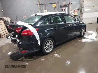 2015 Ford Focus SE with VIN 1FADP3F26FL370311, listed as a IAAI auction lot 41514842 with 126,444 mi miles and . Bid and sale history available at DreamBid. Image 4.