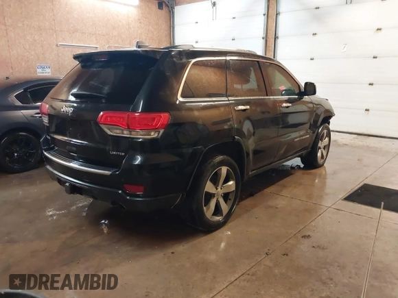 2015 Jeep Grand Cherokee Limited with VIN 1C4RJFBG8FC910133, listed as a IAAI auction lot 41289929 with 141,226 mi miles. Bid and sale history available at carsss.com. Image 4.