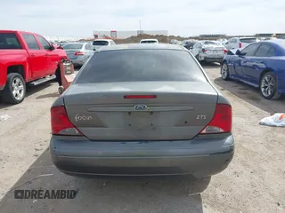 2004 Ford Focus ZTS with VIN 1FAFP38Z94W165483, listed as a IAAI auction lot 41775001 with 222,589 mi miles and . Bid and sale history available at carsss.com. Image 16.