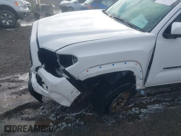 2019 Toyota Tacoma SR z VIN 3TMCZ5AN9KM284092, wystawiony jako IAAI lot #41774851 z przebiegiem 100 031 mil mil oraz . Historia ofert i sprzedaży dostępna na DreamBid. Obrazek 17.