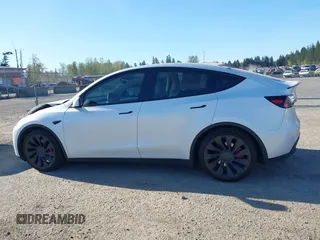 2023 Tesla Model Y Performance with VIN 7SAYGDEF2PF754938, listed as a IAAI auction lot 42067041 with 21,103 mi miles and . Bid and sale history available at DreamBid. Image 14.