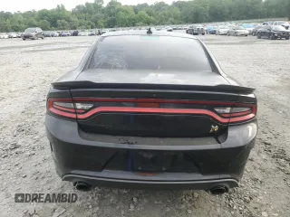 2019 Dodge Charger Scat Pack z VIN 2C3CDXGJ7KH697176, wystawiony jako Copart lot #53702845 z przebiegiem 76 988 mil mil oraz Szkoda całkowita • Salvage title. Historia ofert i sprzedaży dostępna na DreamBid. Obrazek 6.