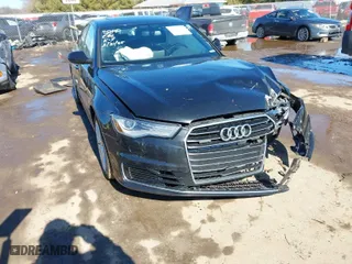 2016 Audi A6 2.0T Premium Plus with VIN WAUGFAFC8GN015571, listed as a IAAI auction lot 41665975 with 125,329 mi miles. Bid and sale history available at carsss.com. Image 1.