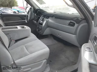 2007 Chevrolet Suburban LT with VIN 1GNFC16007R231427, listed as a IAAI auction lot 40995668 with 168,691 mi miles. Bid and sale history available at carsss.com. Image 5.