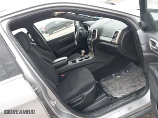 2016 Jeep Grand Cherokee Laredo with VIN 1C4RJFAG0GC504219, listed as a IAAI auction lot 42044039 with 121,734 mi miles. Bid and sale history available at carsss.com. Image 5.