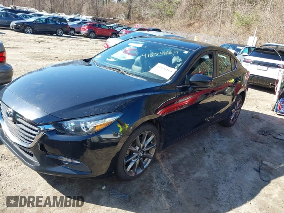 2018 Mazda 3 Touring with VIN 3MZBN1V34JM208669, listed as a IAAI auction lot 41834164 with 117,639 mi miles. Bid and sale history available at carsss.com. Image 17.