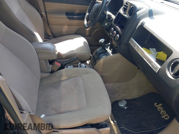 2014 Jeep Compass Sport with VIN 1C4NJCBA0ED511217, listed as a IAAI auction lot 42008976 with 210,780 mi miles. Bid and sale history available at carsss.com. Image 5.