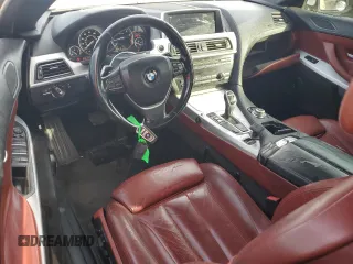 2012 BMW 6 Series 650i z VIN WBALZ3C56CDL72058, wystawiony jako Copart lot #43246815 z przebiegiem 133 048 mil mil oraz Tytuł czysty. Historia ofert i sprzedaży dostępna na DreamBid. Obrazek 8.