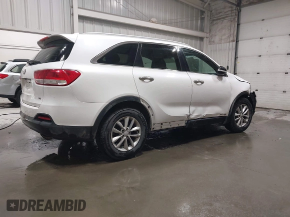 2016 Kia Sorento LX with VIN 5XYPGDA51GG047781, listed as a IAAI auction lot 42137935 with 103,386 mi miles. Bid and sale history available at carsss.com. Image 4.