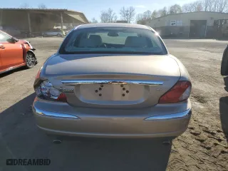 2004 Jaguar X-Type with VIN SAJEA51C14WE01928, listed as a Copart auction lot 80456434 with 32,776 mi miles and Salvage Title. Bid and sale history available at carsss.com. Image 6.