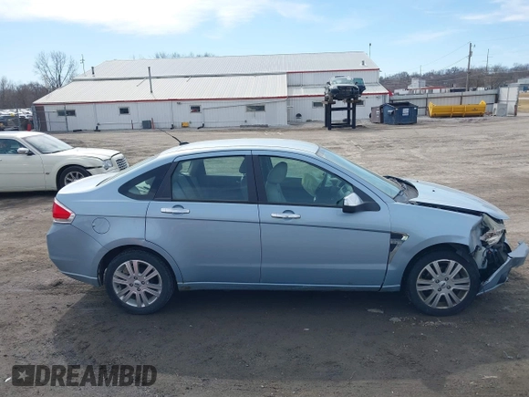 2009 Ford Focus SEL with VIN 1FAHP37N59W164619, listed as a IAAI auction lot 41762640 with 147,643 mi miles. Bid and sale history available at carsss.com. Image 13.