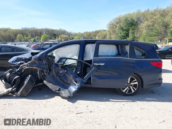 2020 Honda Odyssey Elite with VIN 5FNRL6H95LB052590, listed as a IAAI auction lot 42231280 with 65,165 mi miles and . Bid and sale history available at DreamBid. Image 15.