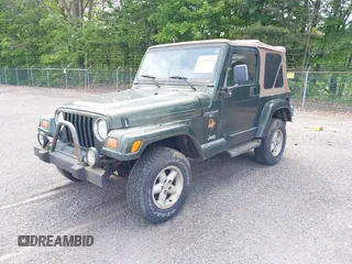 1998 Jeep Wrangler Sahara z VIN 1J4FY49SXWP716218, wystawiony jako IAAI lot #42354433 z przebiegiem 234 378 mil mil oraz . Historia ofert i sprzedaży dostępna na DreamBid. Obrazek 2.