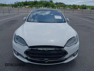 2014 Tesla Model S 60 with VIN 5YJSA1H12EFP39582, listed as a IAAI auction lot 42545143 with 117,383 mi miles and . Bid and sale history available at DreamBid. Image 6.