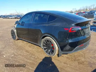 2022 Tesla Model Y Performance with VIN 7SAYGDEFXNF313636, listed as a IAAI auction lot 41660019 with 30,258 mi miles and . Bid and sale history available at DreamBid. Image 3.