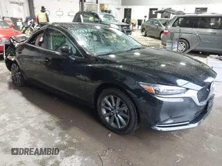 2021 Mazda 6 Sport with VIN JM1GL1UM9M1613243, listed as a IAAI auction lot 41738828 with 35,816 mi miles. Bid and sale history available at carsss.com. Image 1.