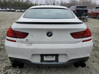 2014 BMW 6 Series 650i xDrive z VIN WBA6B4C54ED371324, wystawiony jako Copart lot #49016325 z przebiegiem 113 395 mil mil oraz Szkoda całkowita • Salvage title. Historia ofert i sprzedaży dostępna na DreamBid. Obrazek 6.
