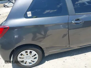 2015 Toyota Yaris L with VIN VNKJTUD35FA054329, listed as a IAAI auction lot 42289132 with 122,257 mi miles and . Bid and sale history available at DreamBid. Image 6.