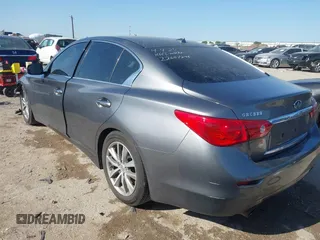 2014 Infiniti Q50 Hybrid Premium with VIN JN1AV7AP4EM691014, listed as a IAAI auction lot 41984130 with 114,230 mi miles and . Bid and sale history available at DreamBid. Image 3.