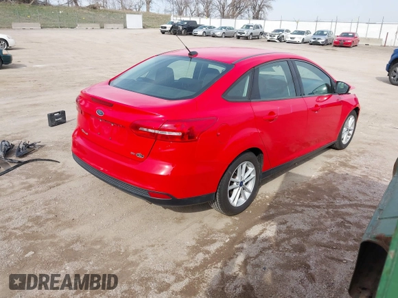 2017 Ford Focus SE with VIN 1FADP3F29HL299463, listed as a IAAI auction lot 41967179 with 84,376 mi miles and . Bid and sale history available at DreamBid. Image 4.