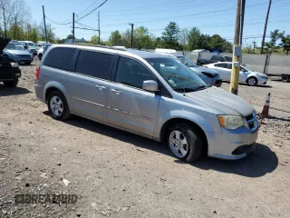 2013 Dodge Grand Caravan SXT with VIN 2C4RDGCG0DR582254, listed as a Copart auction lot 54735205 with 126,071 mi miles and Salvage Title. Bid and sale history available at DreamBid. Image 4.