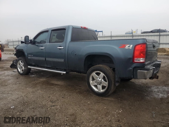2013 GMC Sierra 2500HD SLT with VIN 1GT121E82DF212436, listed as a Copart auction lot 80863174 with 209,280 mi miles and Salvage title. Bid and sale history available at DreamBid. Image 2.