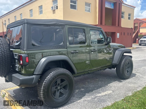 2023 Jeep Wrangler Willys with VIN 1C4HJXDN1PW530435, listed as a Copart auction lot 64590515 with 4,363 mi miles and Clean title. Bid and sale history available at DreamBid. Image 4.