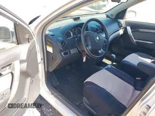 2009 Chevrolet Aveo 1LT with VIN KL1TD66E19B651119, listed as a IAAI auction lot 41648261 with 132,456 mi miles and . Bid and sale history available at DreamBid. Image 14.