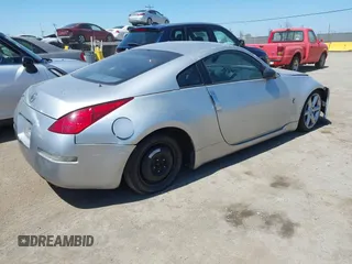 2005 Nissan 350Z Touring with VIN JN1AZ34E85M651414, listed as a IAAI auction lot 42078892 with 155,280 mi miles. Bid and sale history available at carsss.com. Image 4.