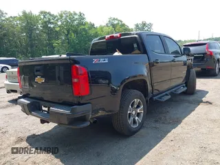 2017 Chevrolet Colorado 4WD Z71 with VIN 1GCGTDEN7H1265540, listed as a IAAI auction lot 42419600 with 140,998 mi miles and . Bid and sale history available at DreamBid. Image 4.