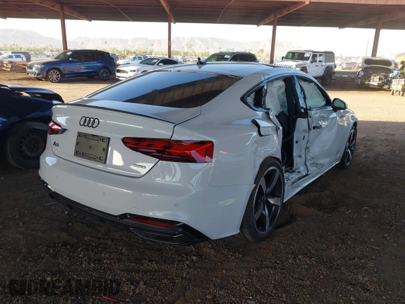 2023 Audi A5 Sportback S line Premium Plus z VIN WAUFACF50PA037465, wystawiony jako IAAI lot #42115428 z przebiegiem 34 463 mil mil oraz . Historia ofert i sprzedaży dostępna na DreamBid. Obrazek 4.