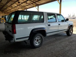1993 Chevrolet Suburban z VIN 1GNGK26K8PJ352462, wystawiony jako Copart lot #76616364 z przebiegiem 147 505 mil mil oraz Czysty tytuł • Clean title. Historia ofert i sprzedaży dostępna na DreamBid. Obrazek 3.