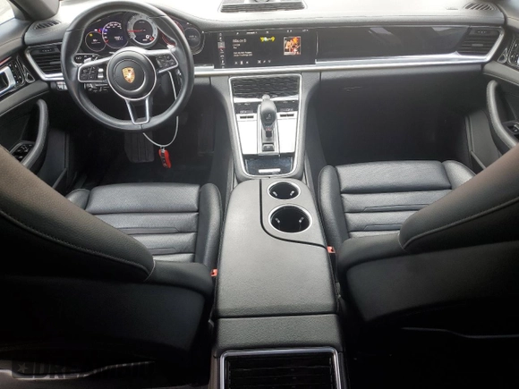 2018 Porsche Panamera с VIN WP0AA2A76JL111841, выставлен на аукционе Copart как лот 55486285 с пробегом 55 831 миль миль и Списание • Salvage title. История ставок и продаж доступна на DreamBid. Изображение 8.