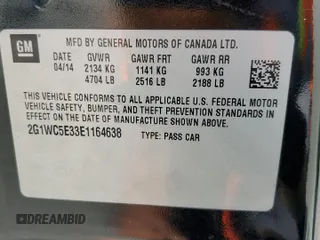2014 Chevrolet Impala LTZ with VIN 2G1WC5E33E1164638, listed as a Copart auction lot 58699635 with 189,636 mi miles and Salvage title. Bid and sale history available at DreamBid. Image 12.