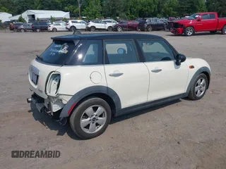 2015 MINI Hardtop 4 Door with VIN WMWXS5C5XFT827330, listed as a IAAI auction lot 42402965 with 140,648 mi miles and . Bid and sale history available at DreamBid. Image 4.
