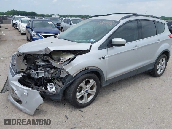 2013 Ford Escape SE with VIN 1FMCU0GX9DUD68711, listed as a IAAI auction lot 42243521 with 120,441 mi miles and . Bid and sale history available at DreamBid. Image 2.