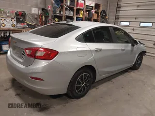 2018 Chevrolet Cruze LS with VIN 1G1BC5SM5J7228803, listed as a IAAI auction lot 41816363 with 101,311 mi miles and . Bid and sale history available at DreamBid. Image 4.